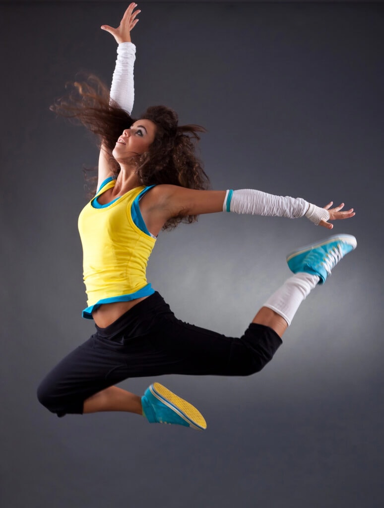 stylish dancer jumping in the air pose idea
