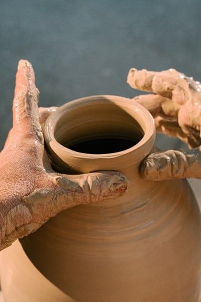 Ceramics, man working making a vase