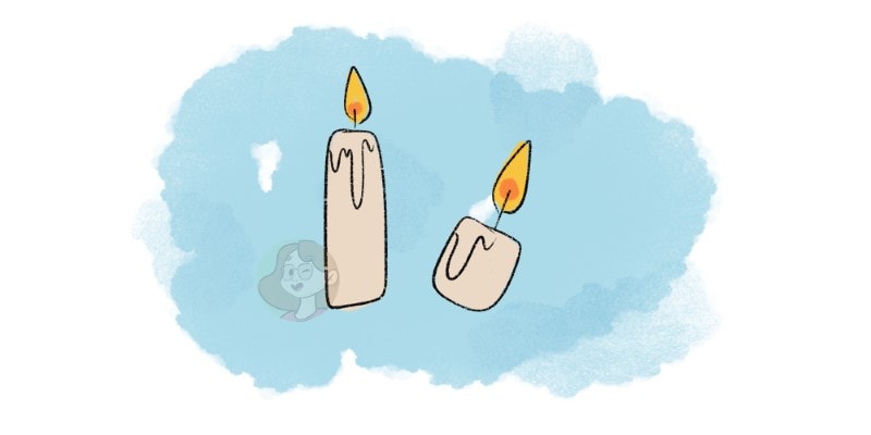 a pair of candles drawn in a cartoon style, great for halloween!