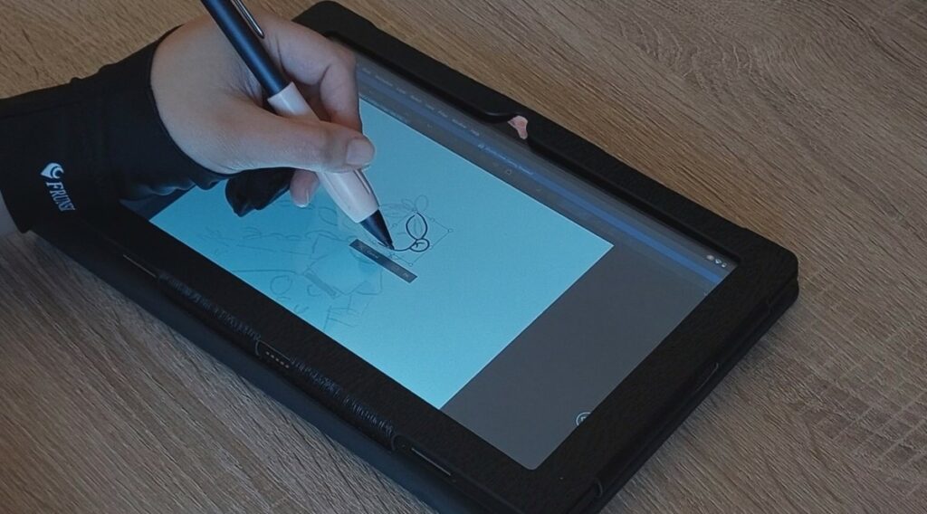 artist using a drawing glove on screen drawing tablet, patricia at don corgi
